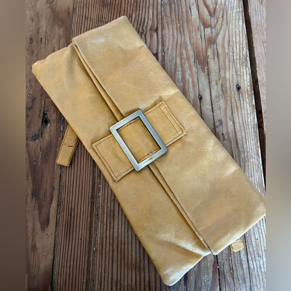 Vintage mango-colored leather clutch
